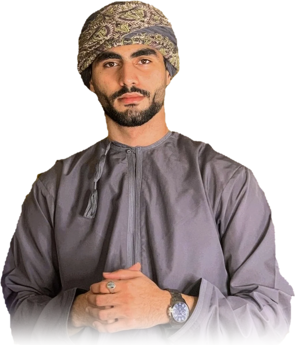 Shihab Mebarez in a grey dishdasha and a patterned massar