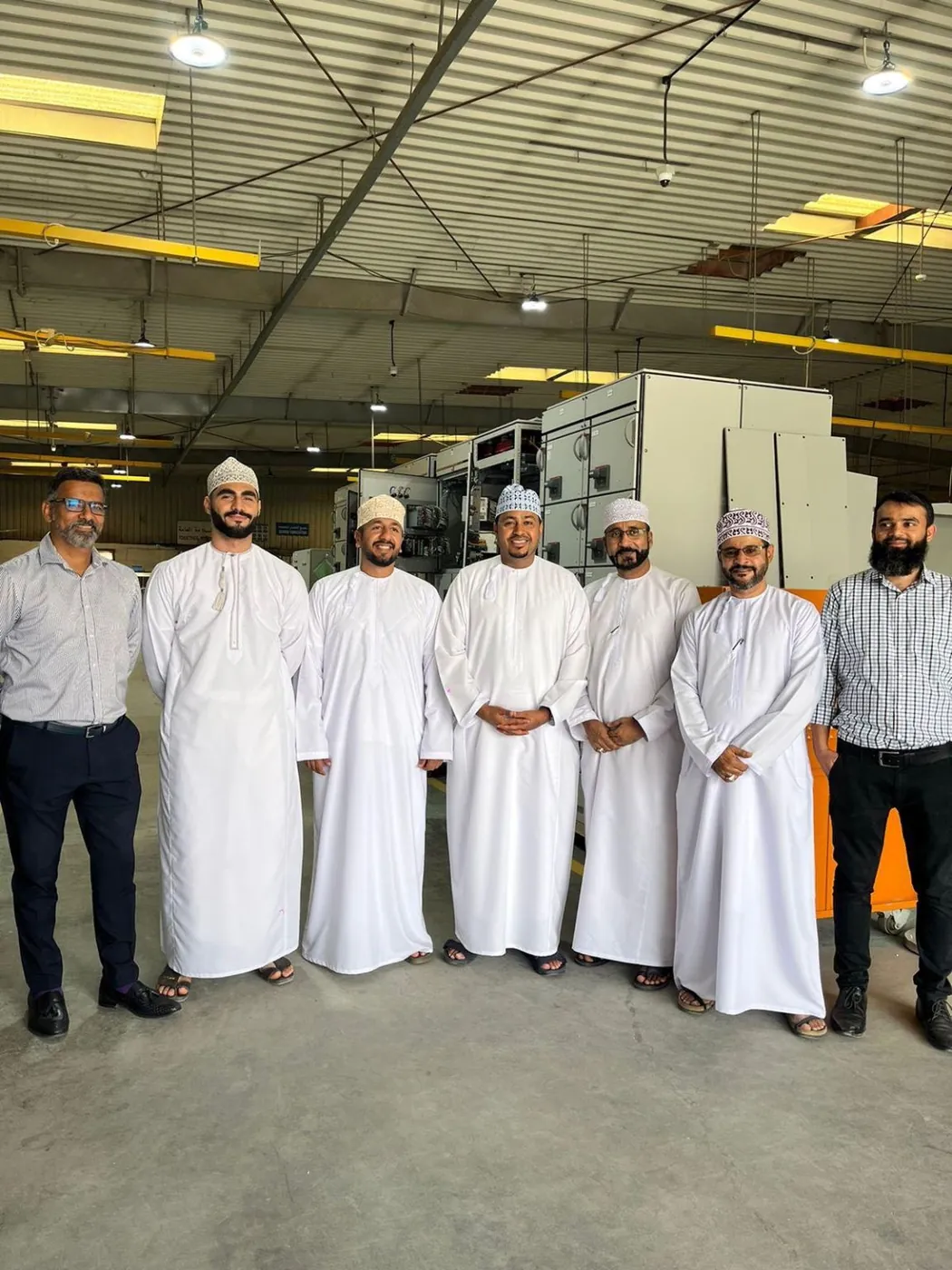 Shihab Mebarez with the Al Hassan LLC team at their factory